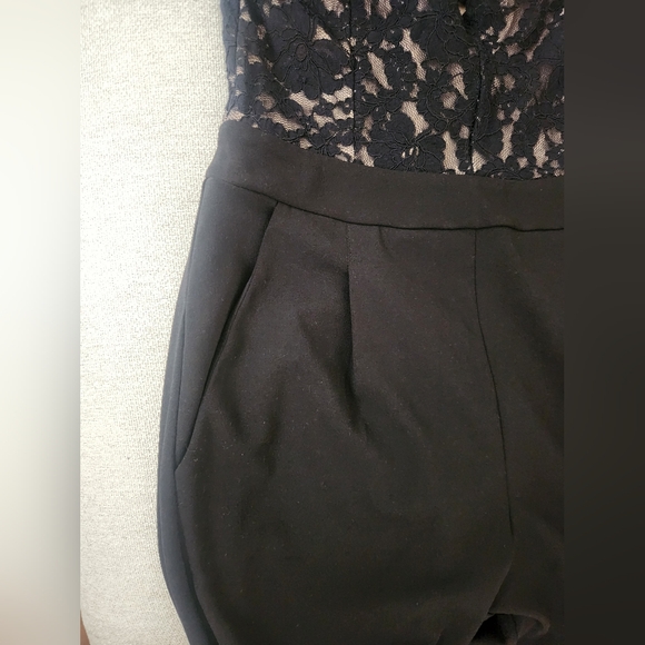 Express Black Jumpsuit with Elegant Lace Detailing - Picture 7 of 16